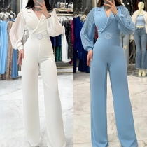 Jumpsuit med vida ben och stilfull krage, långärmad design