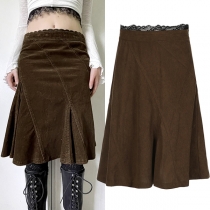 Brun vintage-kjol med spetsdetaljer och volanger i höghusstil
