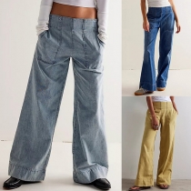 Högmidjade vida jeans med främre patchfickor och vintagetvätt
