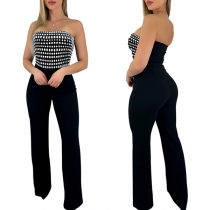 Sexig axelbandslös jumpsuit med strass och vida ben