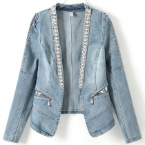 Långärmad jeansjacka med nitar och vintage tvätt