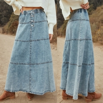 Jeanskjol med knappar fram och resår i midjan, i vintage-tvättad stil