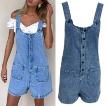 Ledig hängselbyxa med fyrkantig hals, knapplappsfickor och vintage-tvättad denim