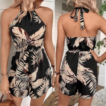 Blommig halterneck rygglös jumpsuit med trendigt tryck