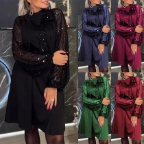 Paljettbeströdd långärmad miniklänning med rosett