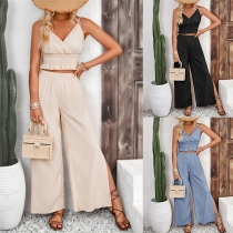 Mode tvådelat set med Cami Crop Top och sidensprickade byxor