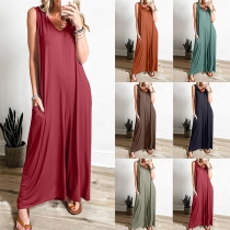 Ärmlös Jumpsuit med Sidfickor och Rund Hals i Ledig Stil