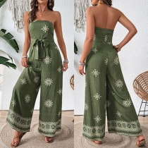 Axelbandslös blommig jumpsuit med självknytning och rak skärning
