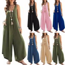 Ledig rund hals ärmlös jumpsuit med sidofickor