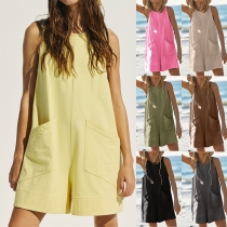 Casual enfärgad ärmlös jumpsuit med fickor