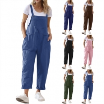 Avslappnad enfärgad jumpsuit med sidfickor