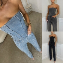 Moderiktigt set i två delar med strass: axelbandslös bandeau och raka byxor