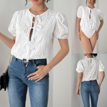 Moderiktig Bodysuit Med Rosett, Rund Hals och Kortärmad Spets