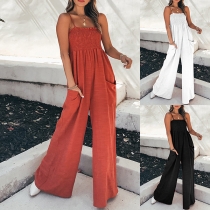 Stilren enfärgad rak jumpsuit med fyrkantig hals och fickor