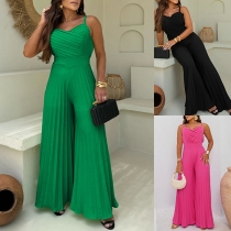 Trendig plisserad jumpsuit med V-ringning, hög midja, öppen rygg och vida ben – enfärgad