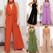 Jumpsuit med vida ben, ärmlös modell, öppen rygg och korsbandsdetaljer