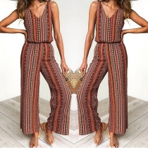 Jumpsuit i randigt mönster med smidiga hängslen och elastisk midja