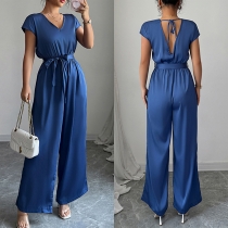 Jumpsuit med V-ringning, knytbar midja och vida ben