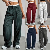Casual dambyxor med hög midja, dekorativa sömmar och diskret draperad detalj