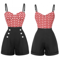 Jumpsuit i shortsmodell med hög midja och dekorativa knappar