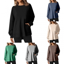 Casual långärmad tröja med rund hals i enfärgad design