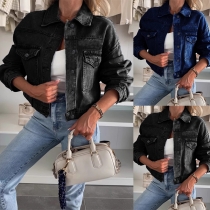 Kort vintage-jeansjacka med ståkrage, långa ärmar och knäppning framtill