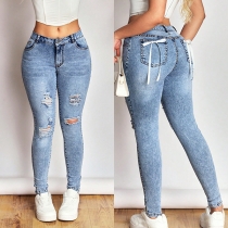 Trendiga skinnyjeans med hög midja och rosettdetalj