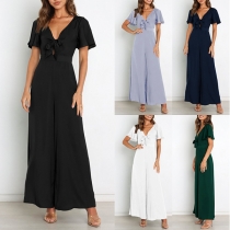 Jumpsuit med utsvängda ben och volangdetaljer