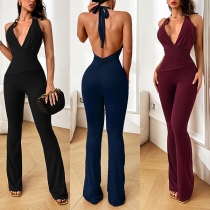 Elegant jumpsuit med halterneck och djup V-ringning