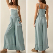 Denimoverall med vintage tvätt, vida ben och extra fickor