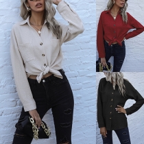 Trendig blus med stående krage, långärmad design och knäppning fram