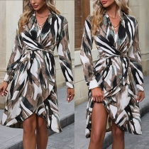 Vintageklänning med oljemålat mönster och markerad midja