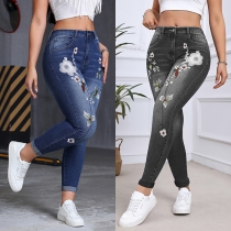 Bootcutjeans med hög midja och broderidetaljer