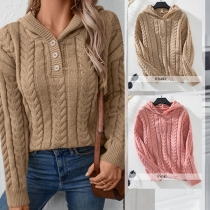 Kabelstickad retrotröja med kraftig stickstruktur och knapprader