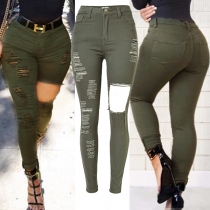 Stretchjeans slim fit med hög midja och slitna detaljer