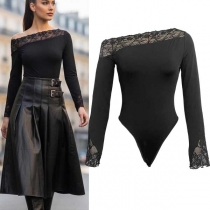 Trendigt spetsbody med asymmetriska axlar och långärmad modell