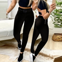 Smala enfärgade byxor – trendig design med sidodragkedja och bälte