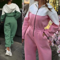 Damjumpsuit i kontrastfärg med dragkedja och långa ärmar – trendig design