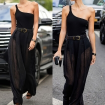 Jumpsuit med asymmetrisk axel, vida ben och midjeskärp