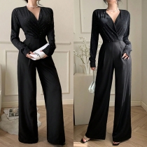 Jumpsuit med bling-bling, V-ringad, puffärmad långärm, hög midja, raka ben och skärp