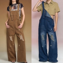 Jumpsuit i denim, vintage stil, justerbara axelband, fyrkantig halsringning, rak passform, gammaltvättad