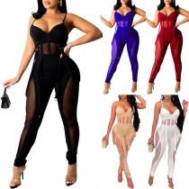 Sexig enfärgad jumpsuit i gasväv med rund hals och ärmlös design