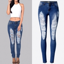 Distressed Style Low-waist Ripped Skinny Jeans