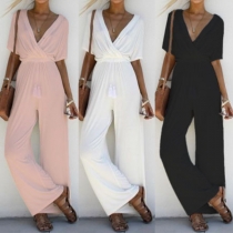 Sexig kortärmad jumpsuit med djup V-ringning och hög midja (små i storlek)