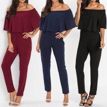 Sexig jumpsuit med volanger, off-shoulder design, båthals och hög midja