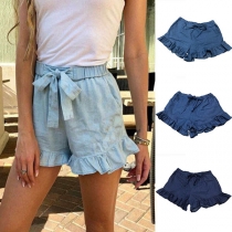 Jeansshorts med hög midja och volangfåll