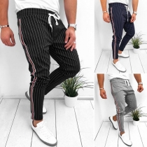 Randiga herrbyxor med dragsko i midjan - casual stil