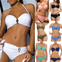 Set med sexig push-up bikini i enfärgad med metallknappar och låg midja