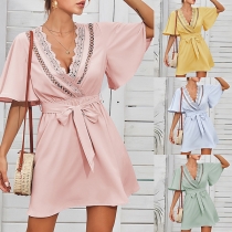 Sexy Lace Spliced V-neck Trumpet Sleeve Solid Color Lace-up Dress