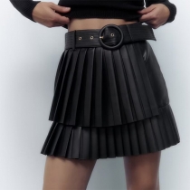 Mode kjol i PU-läder med hög midja och plisserad design, enfärgad med midjeband